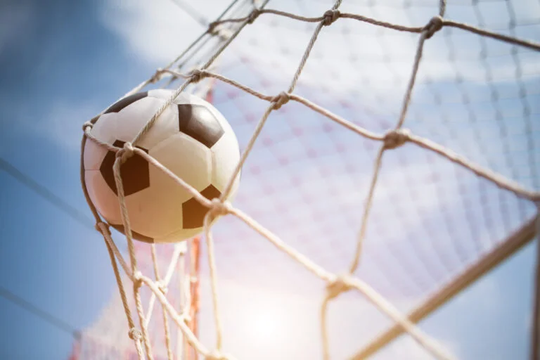 soccer into goal success concept
