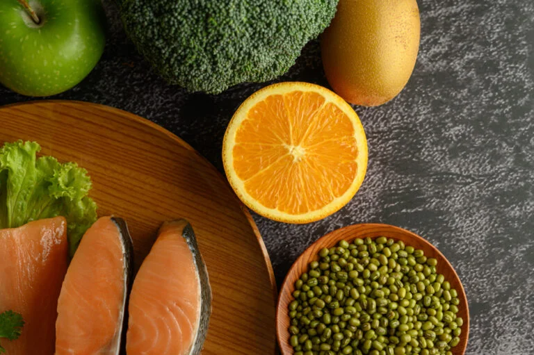 legumes fruit salmon pieces wooden plate 1